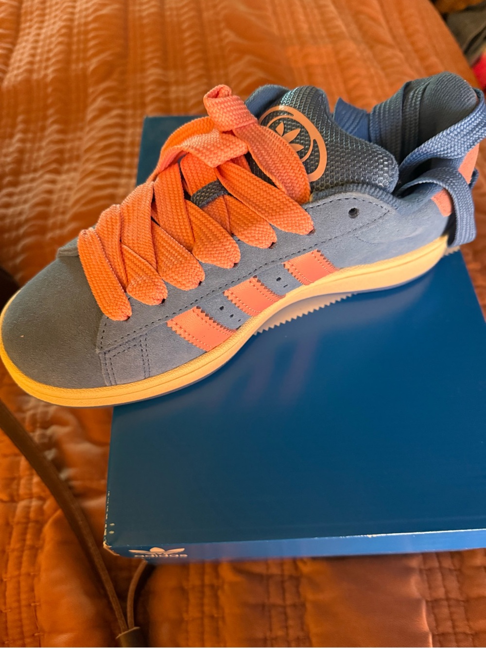 Adidas women’s pink/blue 00s W tennis shoes.
